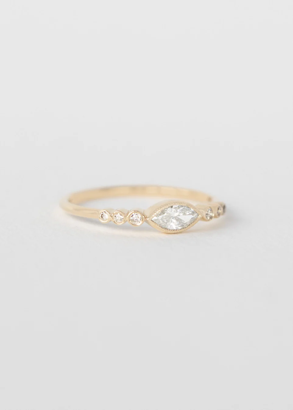 Marquise Diamond & Six Diamonds Ring